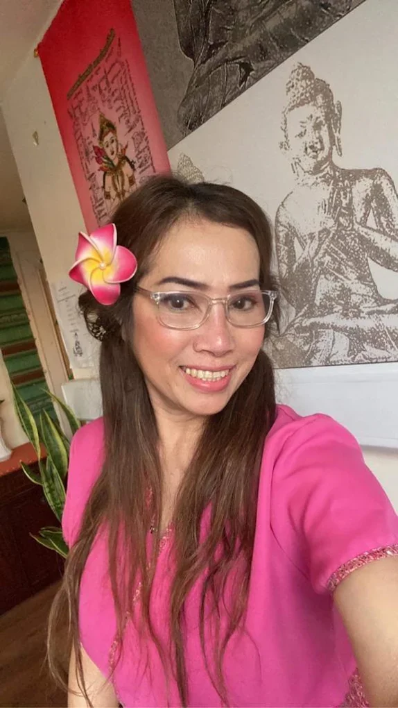 Darani smiling at Tong Thai